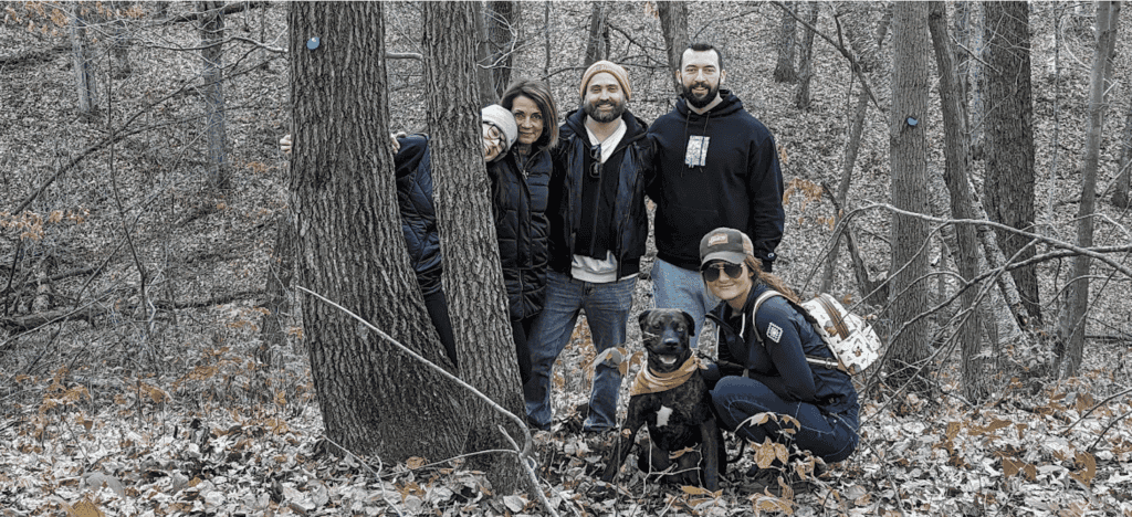 a family by their memorial tree in better place forests St. Croix Valley stay connected to their dad