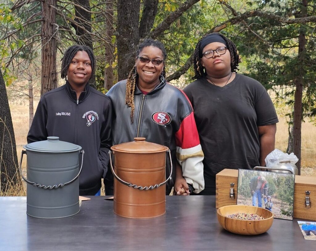 family gathers at memorial table to mix ashes after cremation
